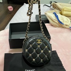 Auth chanel round lucky charm clutch